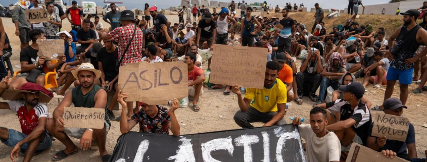 Unos 200 migrantes reclaman asilo en una protesta en el asentamiento del Trampolín en Ceuta